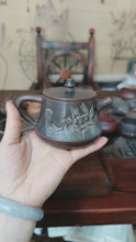 Load and play video in Gallery viewer, Hand Carved China Qinzhou NiXing Pottery Zhuchu Teapots with Lotus on Clay Teapot 210cc-220cc