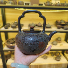Load image into Gallery viewer, Hand-carved Nixing Pottery Beam-handle Teapot with Interlocking Lotus Pattern, Symbolizing Everlasting Fortune and Blessings, Large Capacity 650ml
